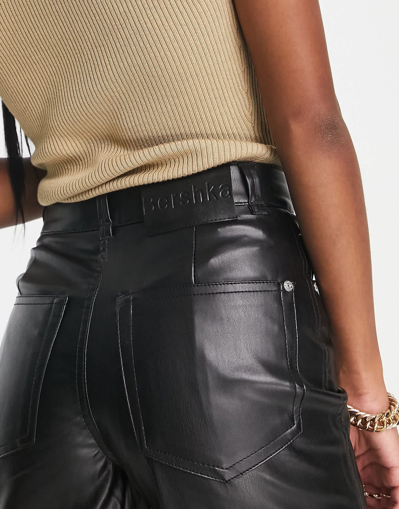Bershka Petite straight leg faux leather trouser in black