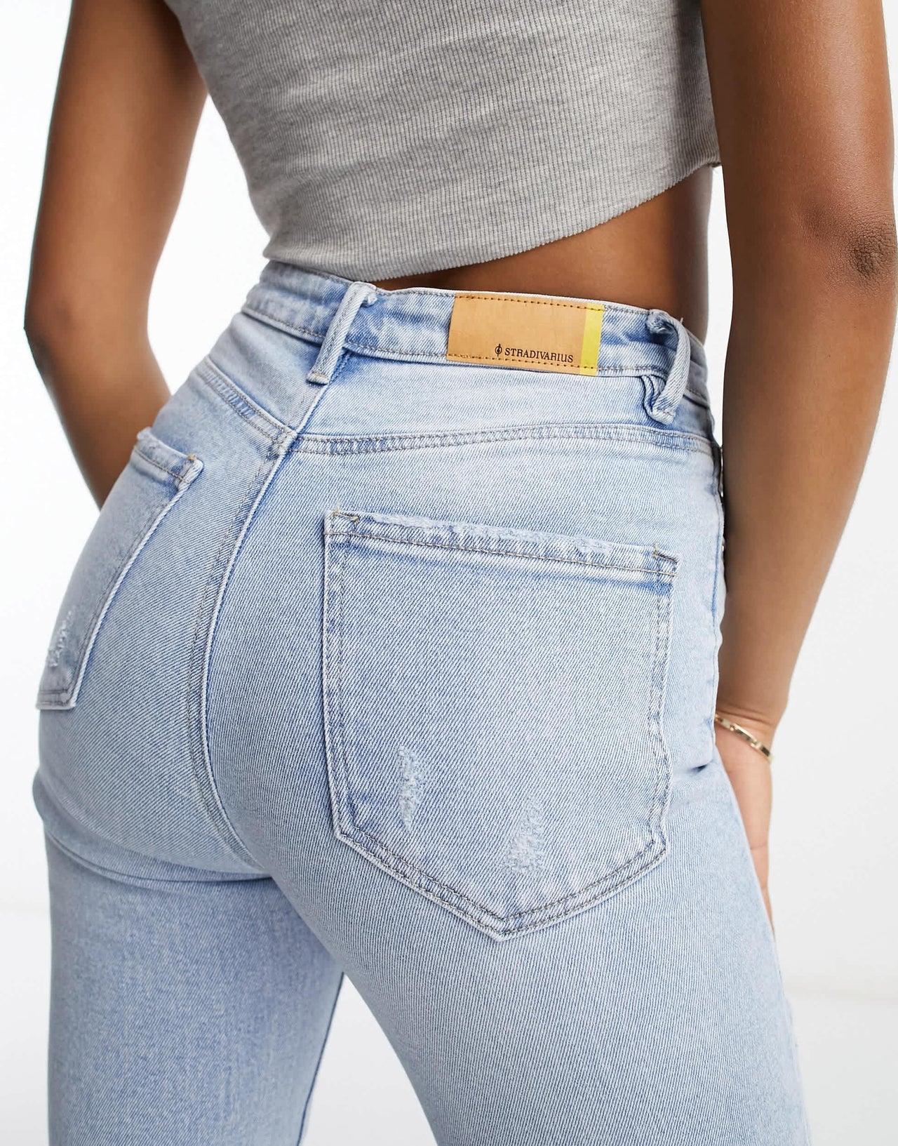 Stradivarius Tall slim mom jean with stretch and rip in vintage blue