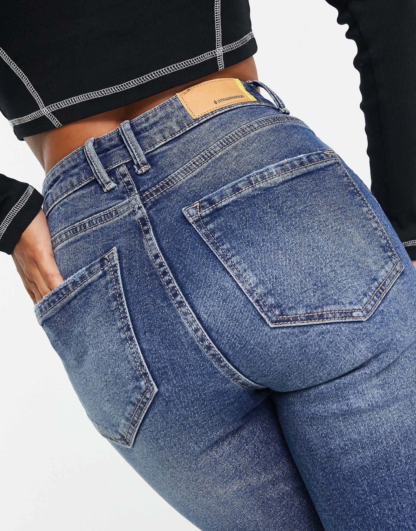 Stradivarius Petite slim mom jean with stretch and rip in medium blue