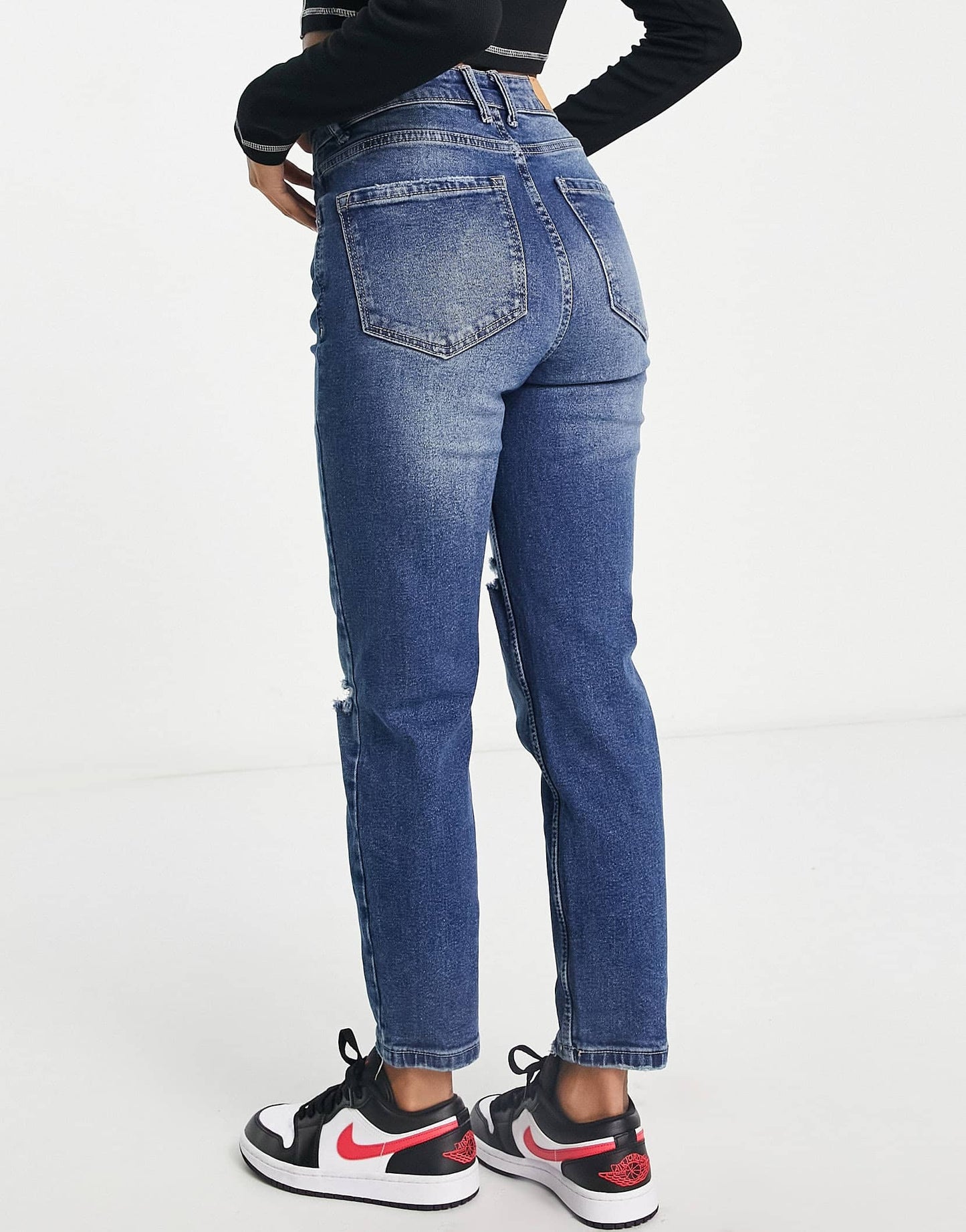 Stradivarius Petite slim mom jean with stretch and rip in medium blue