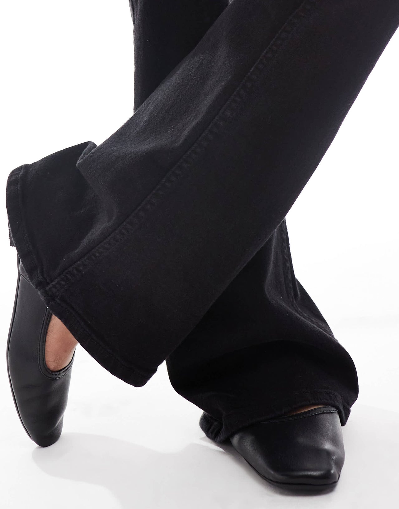 Bershka Petite bootcut flared jeans in black