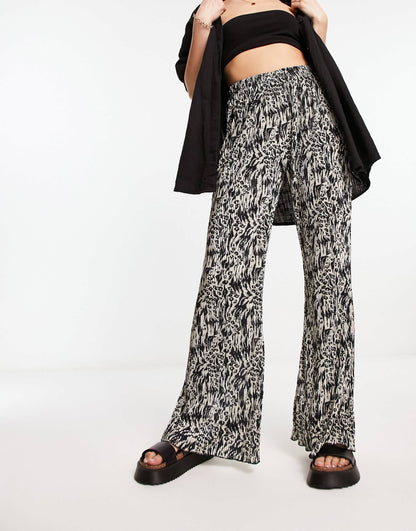 Urban Threads plisse trousers in abstract animal print