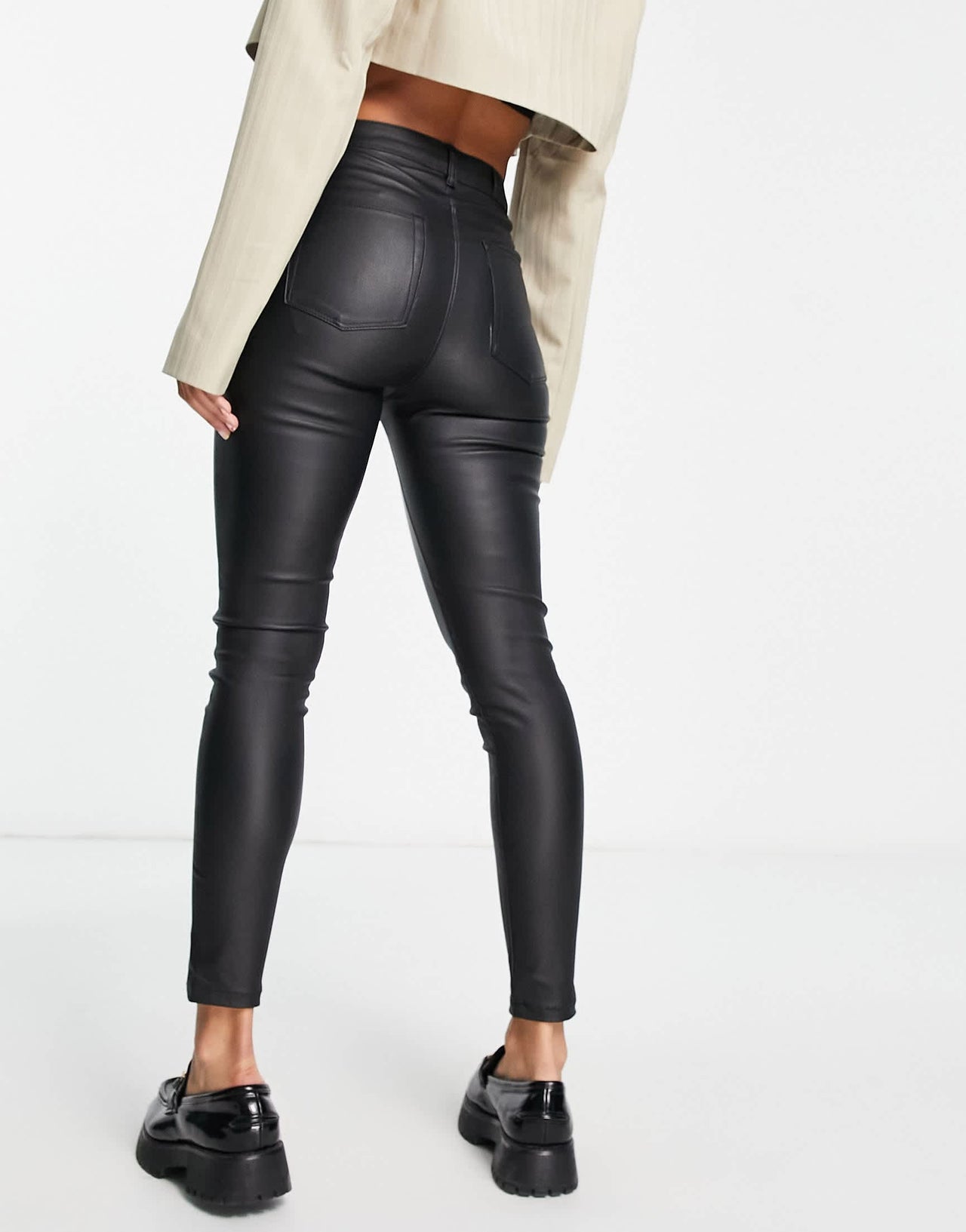 Bershka coated faux leather skinny trouser in black