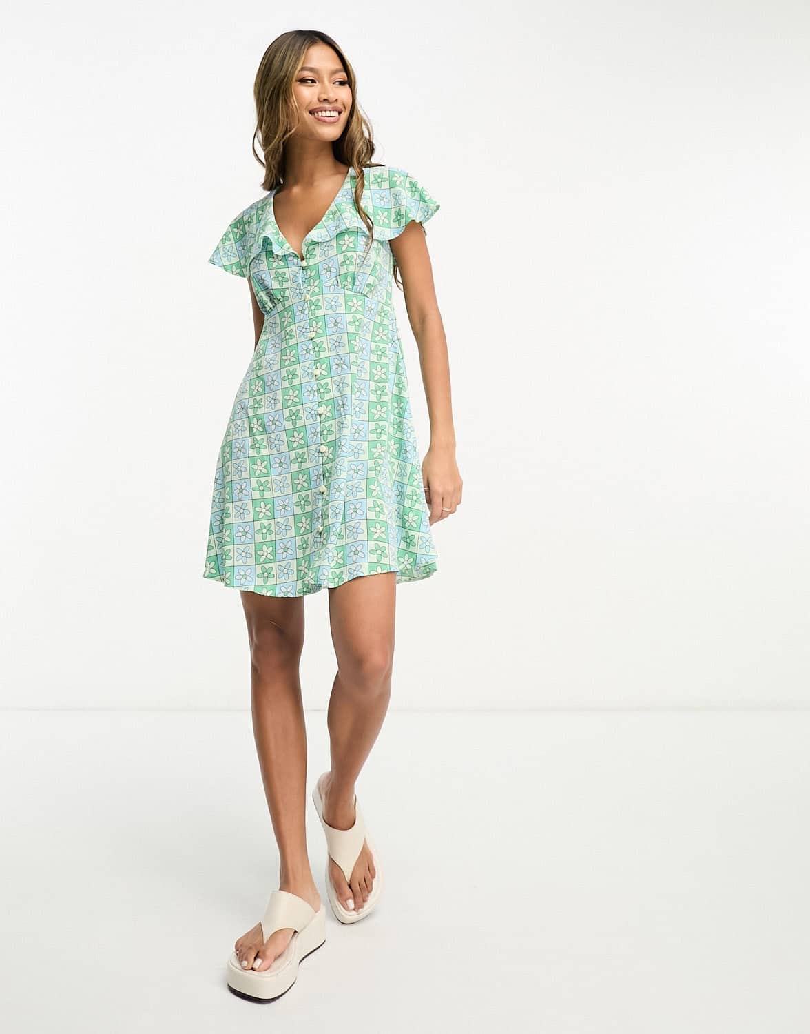 ASOS DESIGN flutter sleeve mini tea dress with buttons in blue tile print