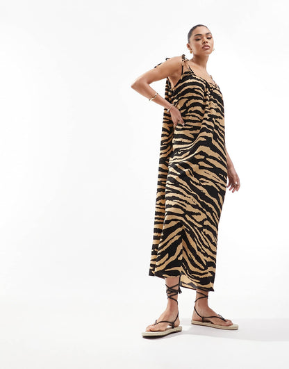 ASOS DESIGN tie strap detail trapeze maxi slip dress in animal print