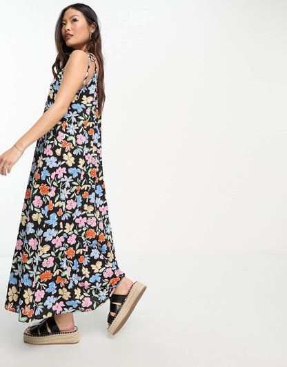 ASOS DESIGN Petite tie strap detail trapeze maxi slip dress in multi floral print