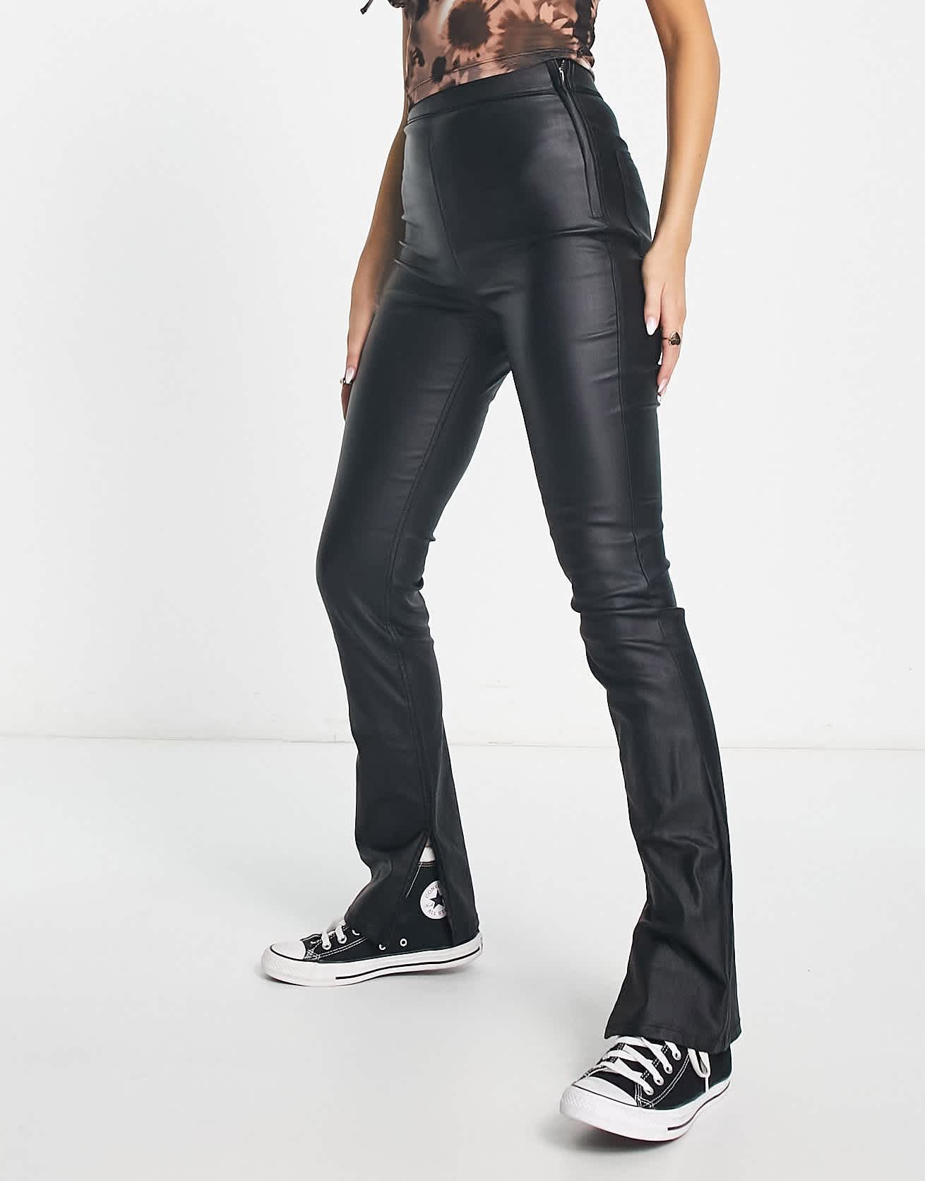 Stradivarius coated flare jean with split hem detail in black