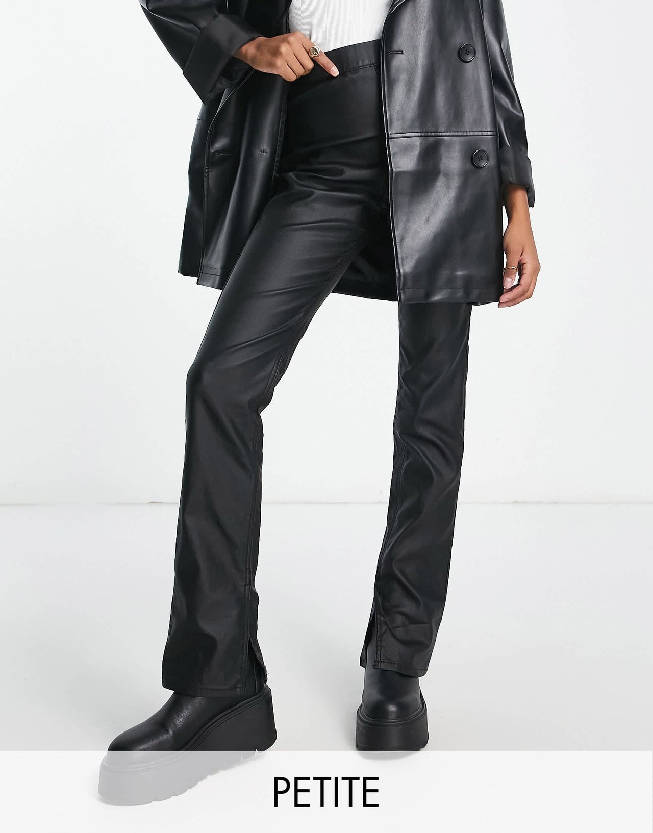 Stradivarius Petite coated flare jean with split hem detail in black