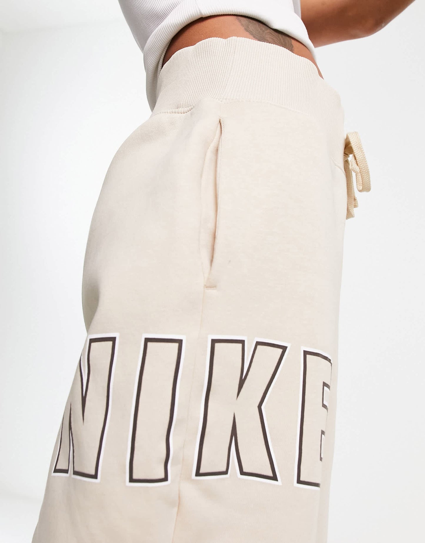 Nike varsity oversized joggers in sanddrift beige