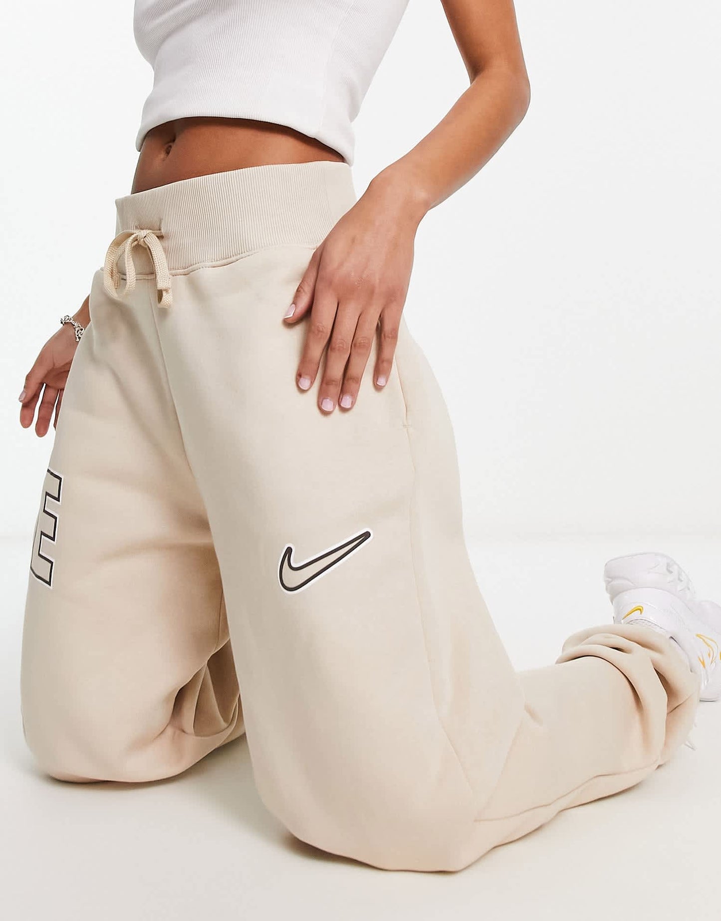 Nike varsity oversized joggers in sanddrift beige