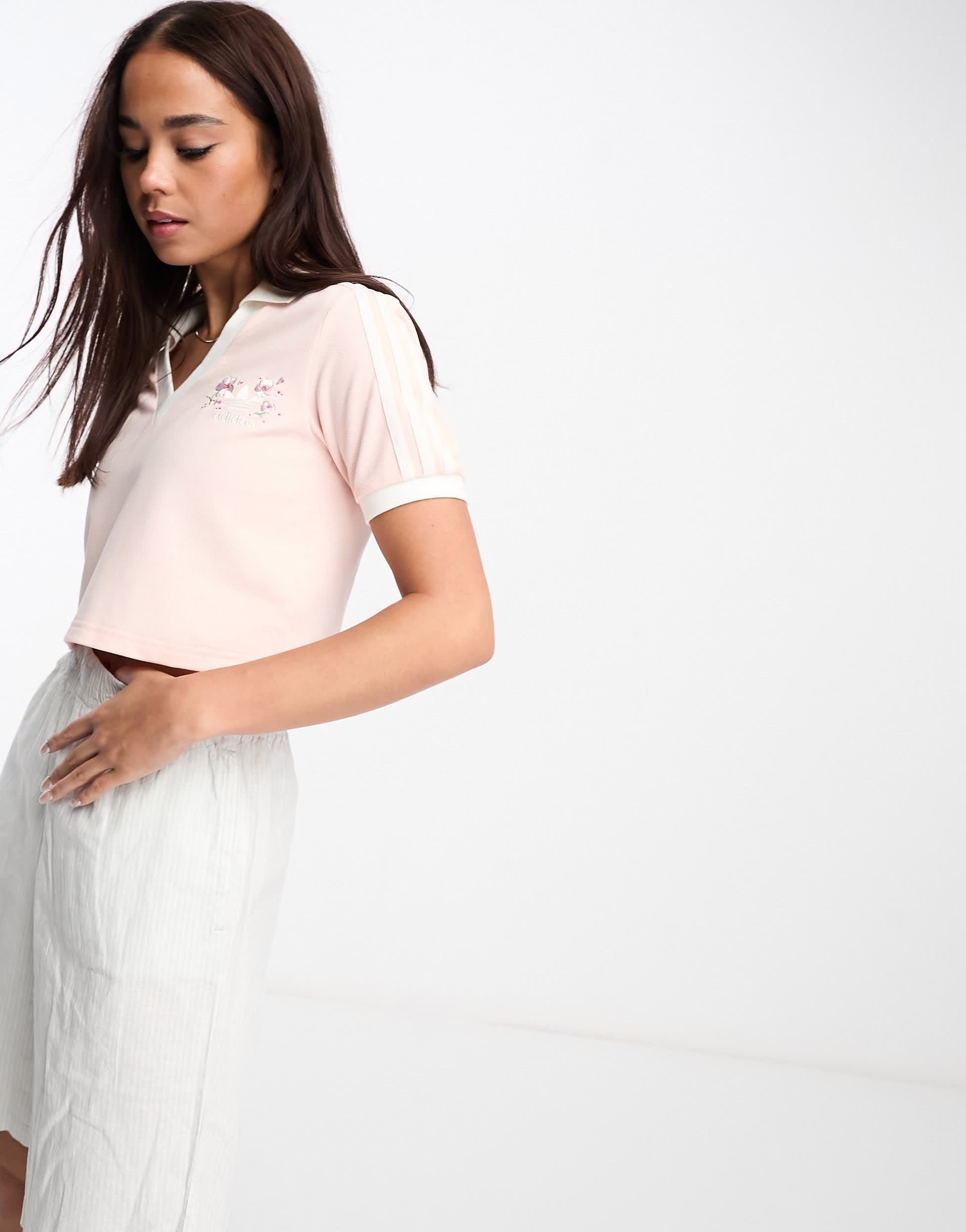 adidas Originals crop polo t-shirt in pastel pink with floral logo