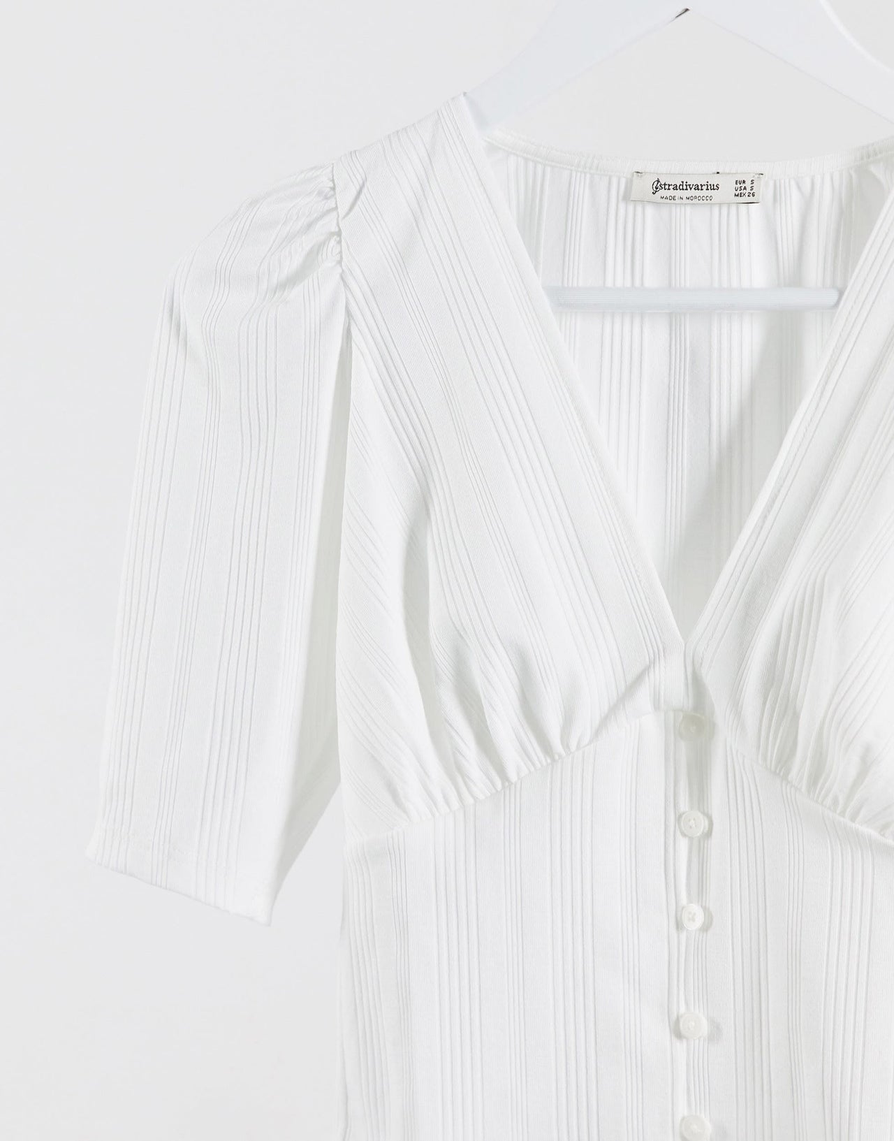 Stradivarius v-neck top with button detail in white