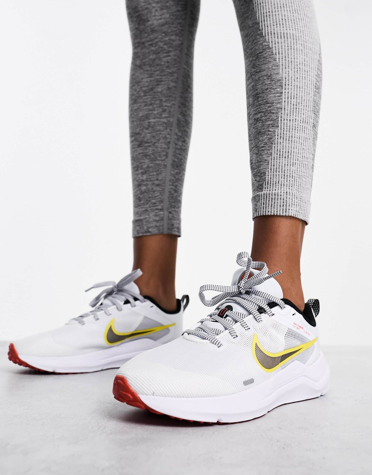 Nike Downshifter trainers in white