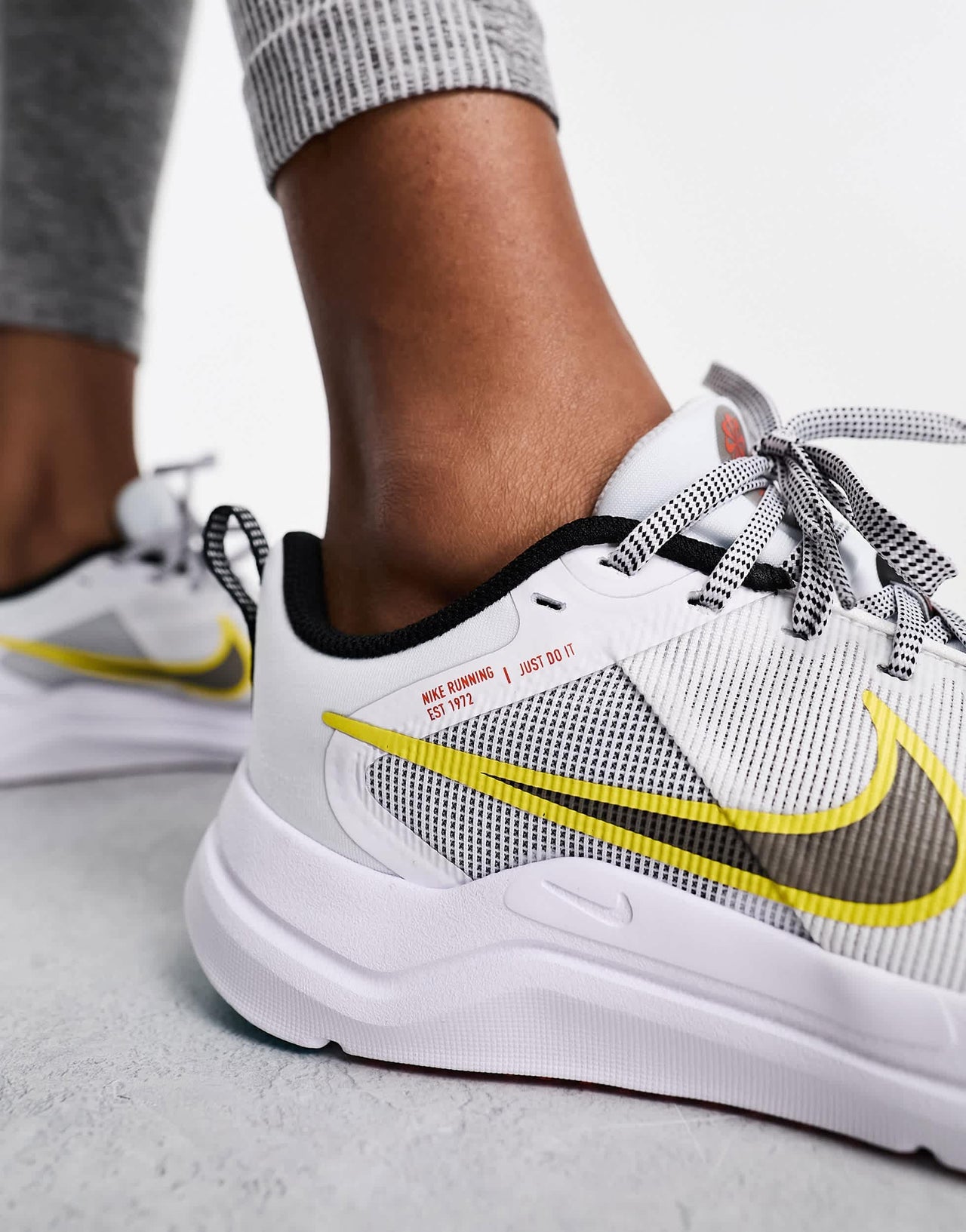 Nike Downshifter trainers in white