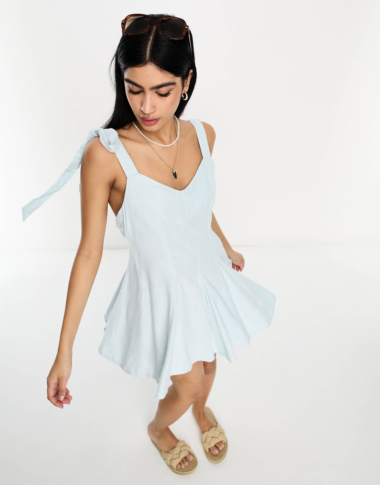 ASOS DESIGN linen tie cross strap swing mini sundress with godets in blue
