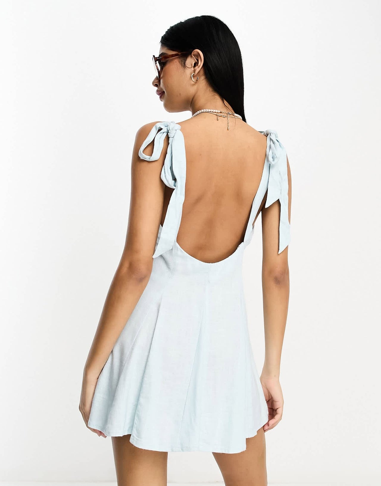 ASOS DESIGN linen tie cross strap swing mini sundress with godets in blue