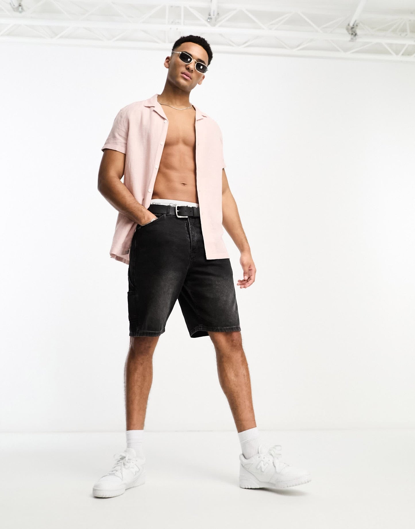 ASOS DESIGN regular linen revere shirt with roll sleeves in pink