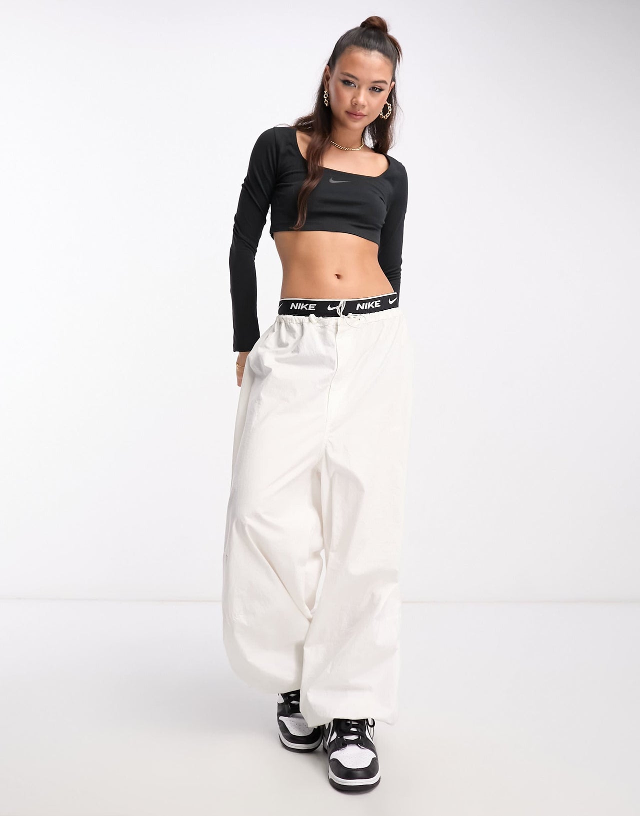 Nike Dance mini swoosh long sleeve crop top in black