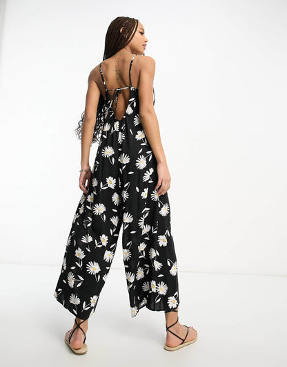 ASOS DESIGN strappy culotte jumpsuit in large daisy print