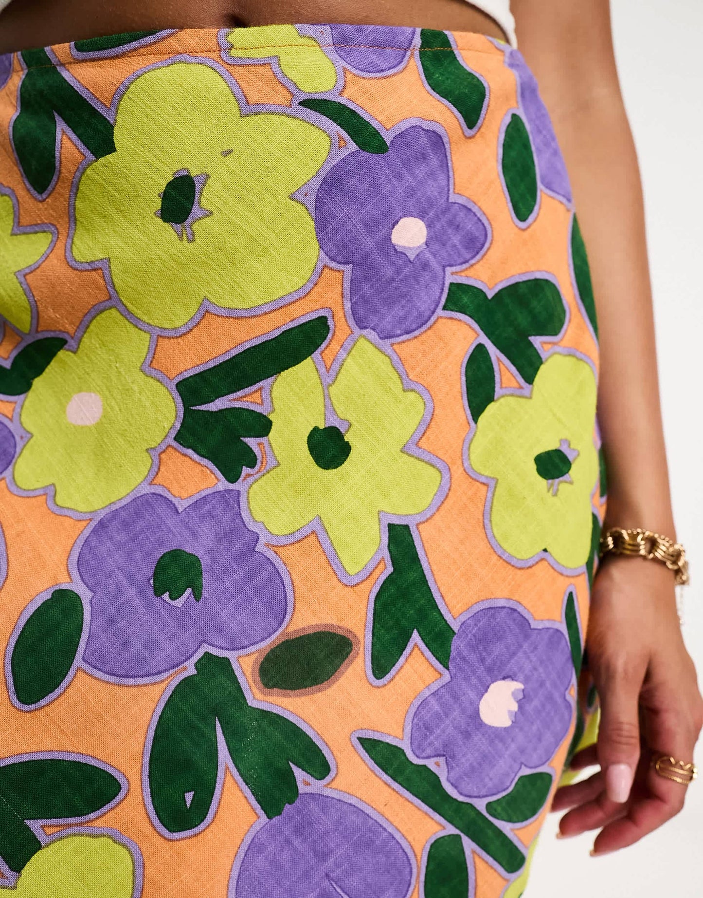ASOS DESIGN linen mini slip skirt in orange floral print