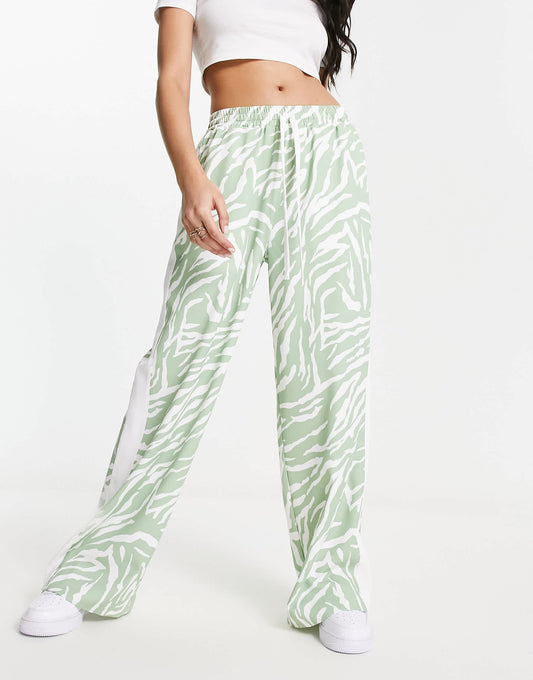 ASOS DESIGN pull on trouser with contrast panel in animal print in sage