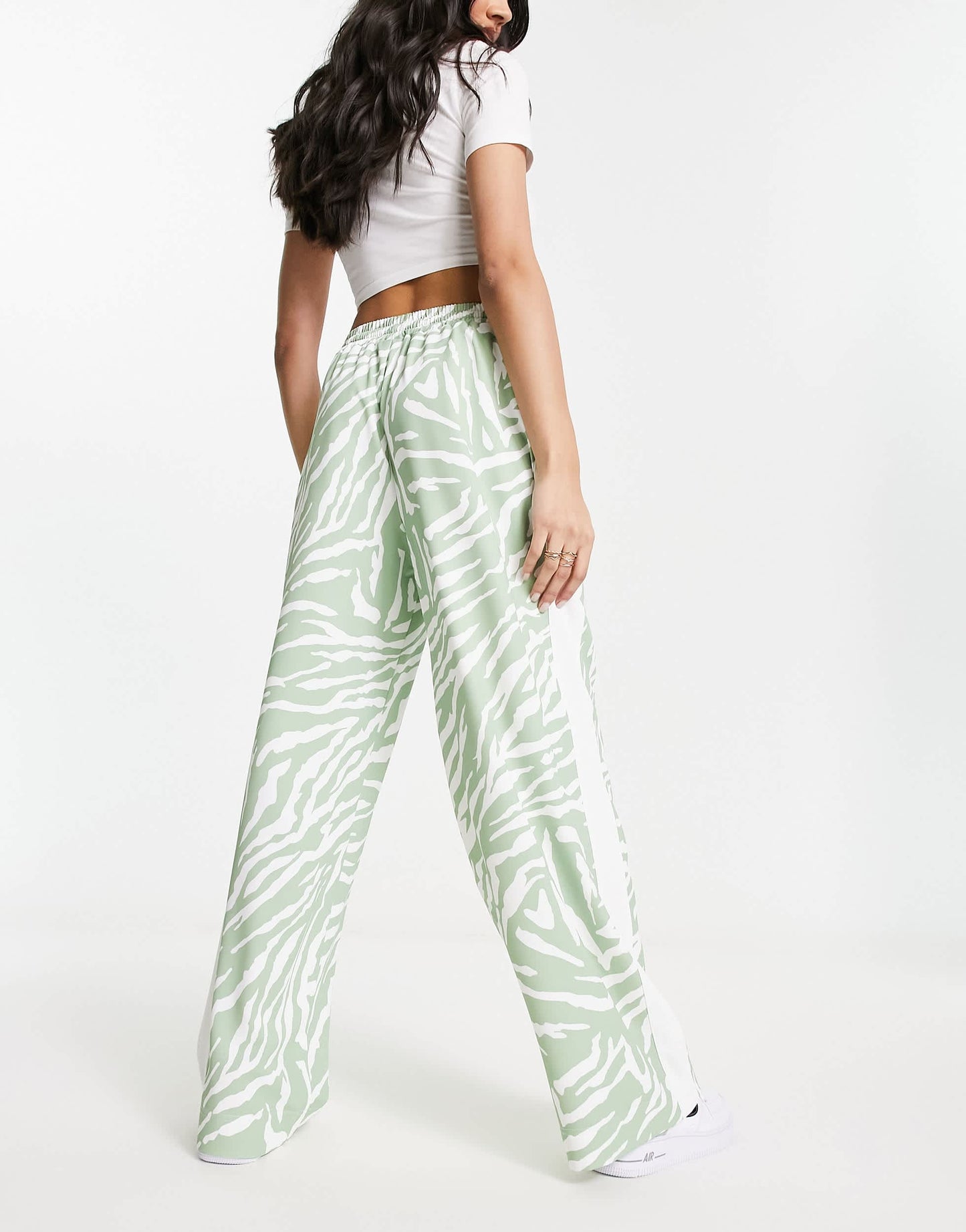 ASOS DESIGN pull on trouser with contrast panel in animal print in sage