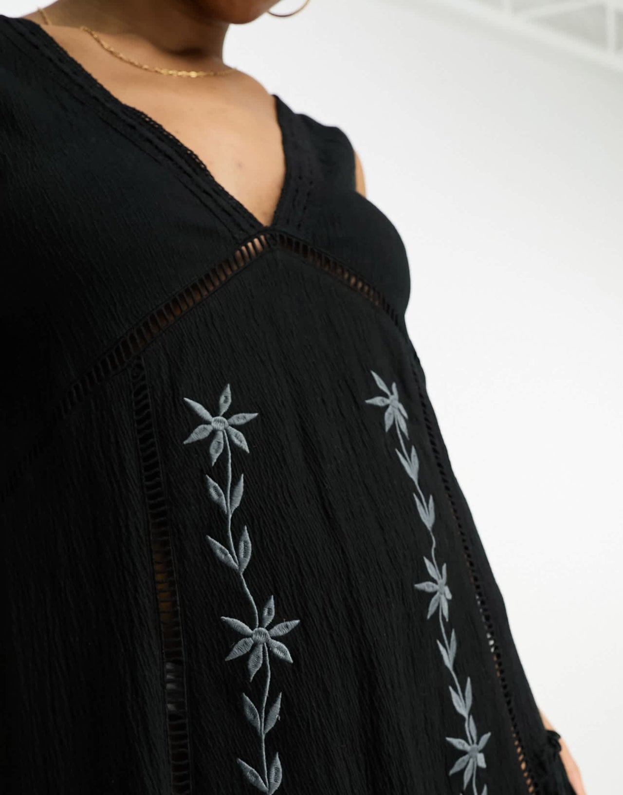 ASOS DESIGN crinkle sleeveless mini dress with embroidered contrast panel in black