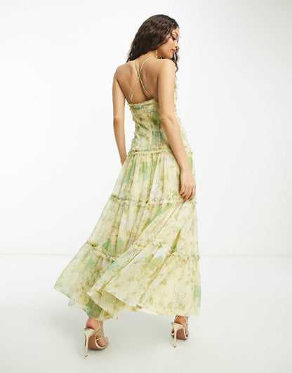 ASOS DESIGN Petite knot front cut out maxi slip dress with raw edge tiers in yellow floral print