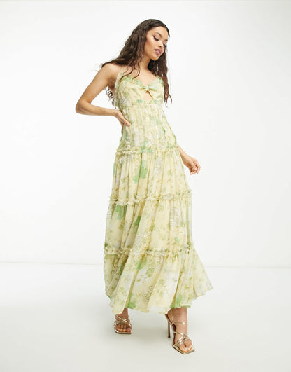 ASOS DESIGN Petite knot front cut out maxi slip dress with raw edge tiers in yellow floral print