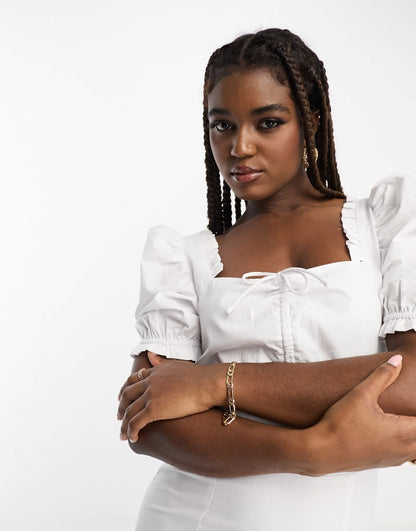 The Frolic exclusive puff sleeve milkmaid mini dress in white