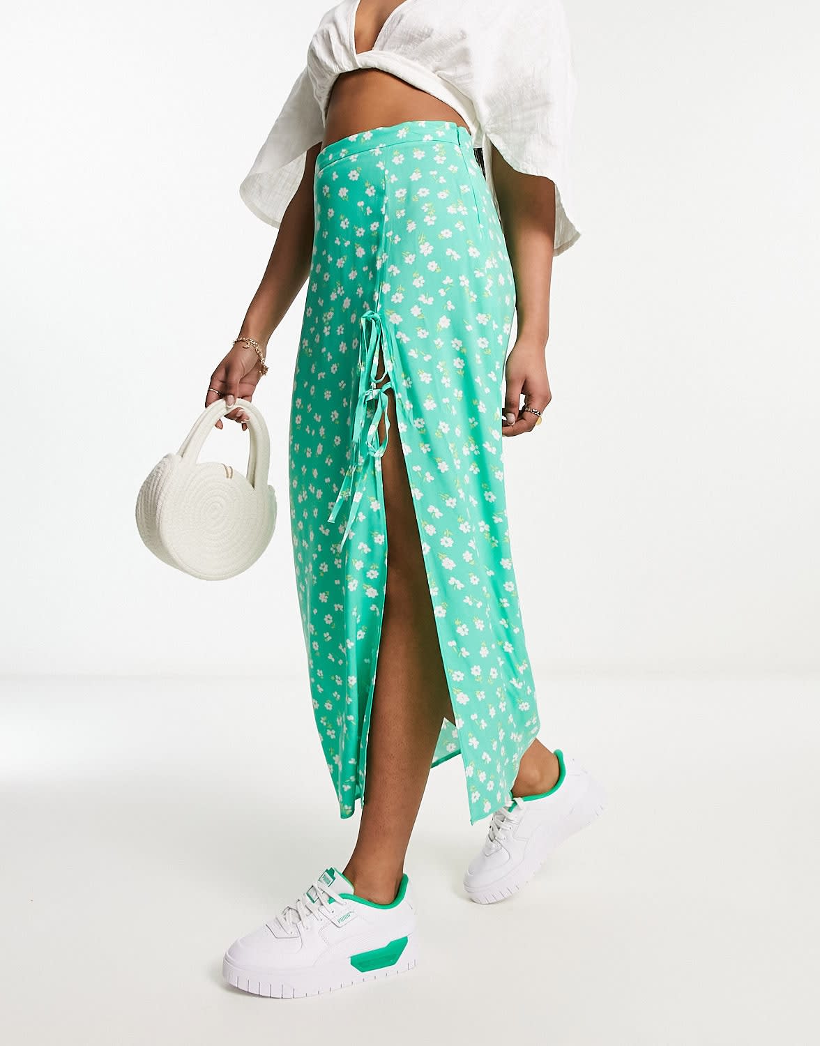 ASOS DESIGN bow detail midi skirt with thigh split in green ditsy floral