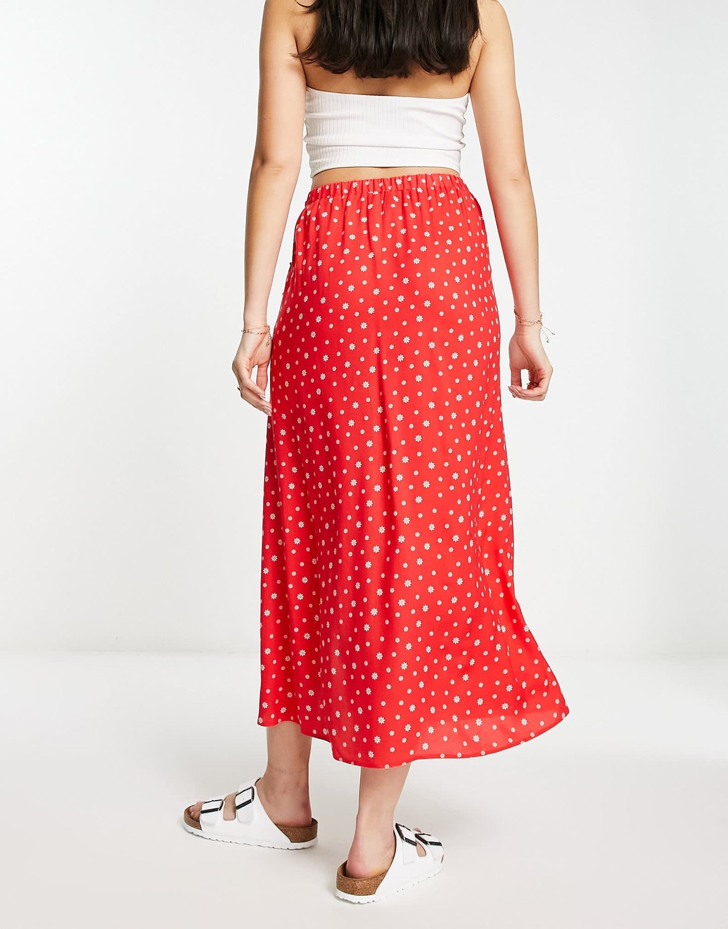 ASOS DESIGN wrap midi skirt with button detail in red ditsy floral