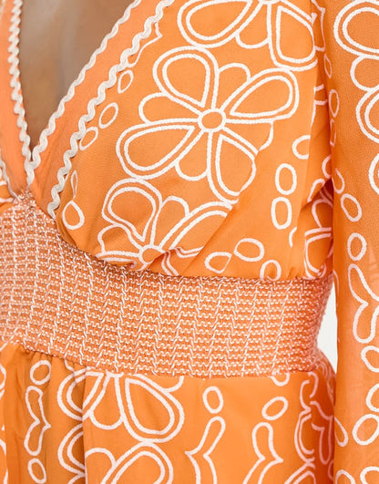 River Island embroidered ruffle hem mini beach dress with floaty sleeves in orange