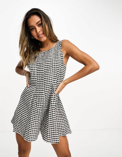 ASOS DESIGN textured godet chuck on playsuit in mono gingham