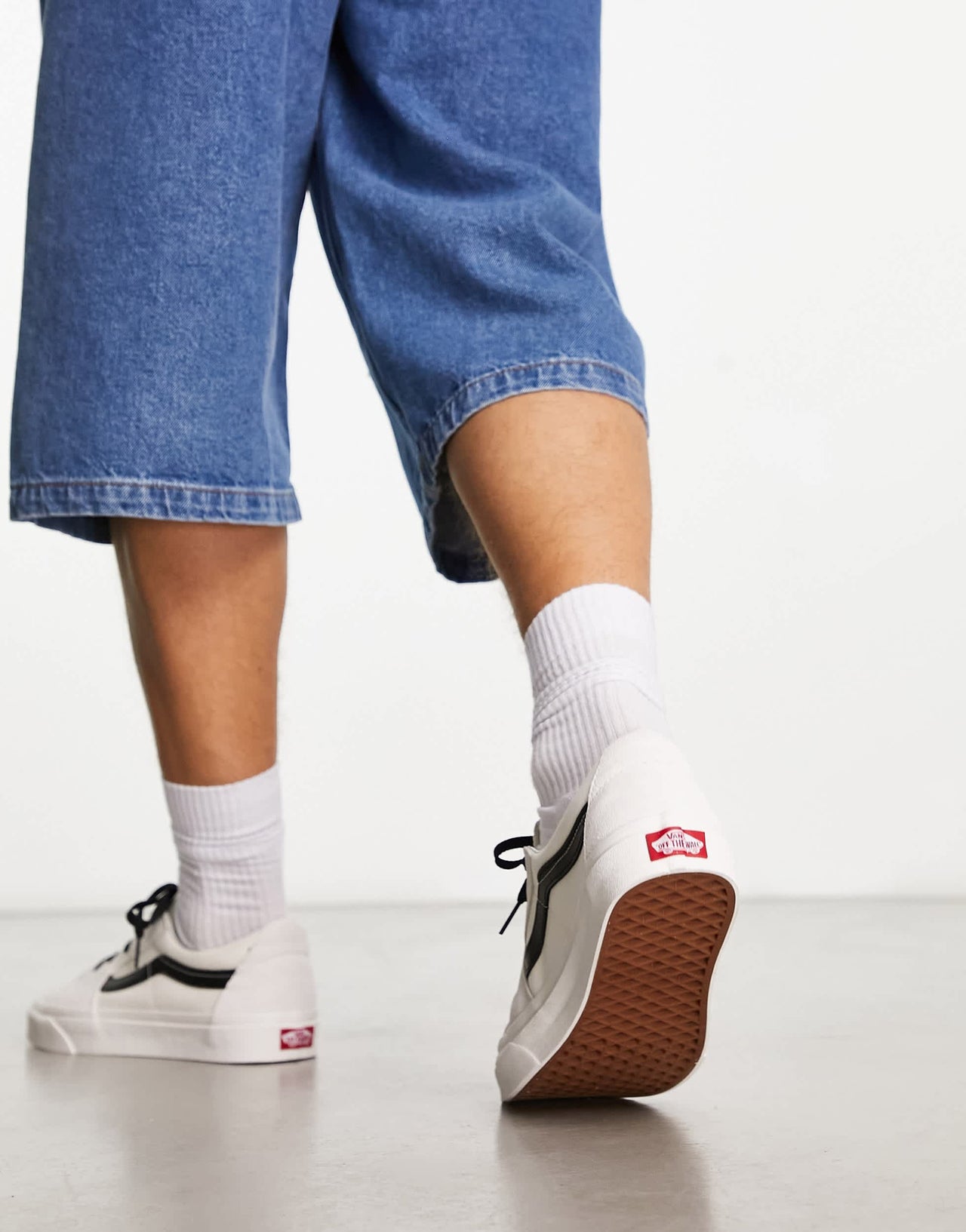 Vans SK8-Low trainers in off white with black side stripe