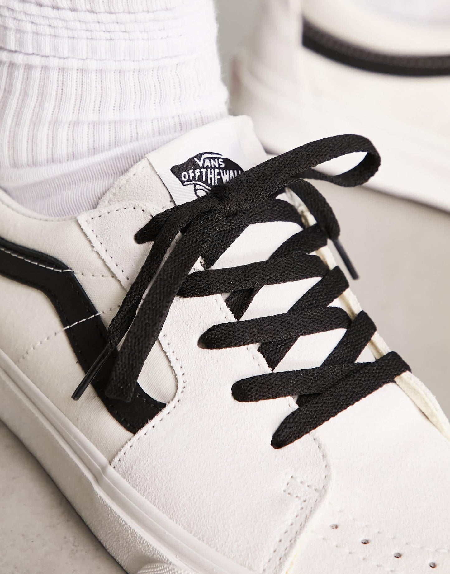 Vans SK8-Low trainers in off white with black side stripe