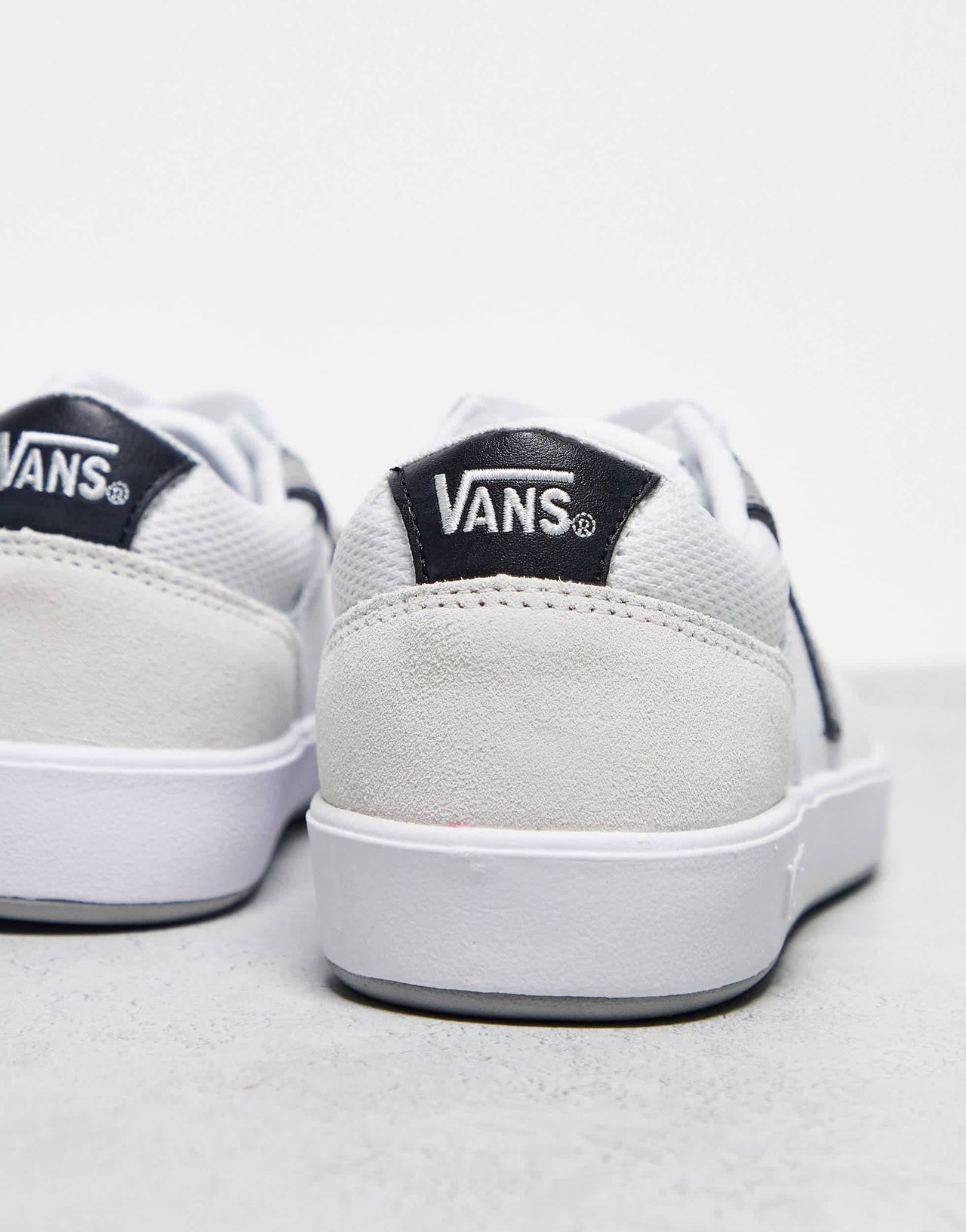 Vans Lowland trainers in white with grey side stripe