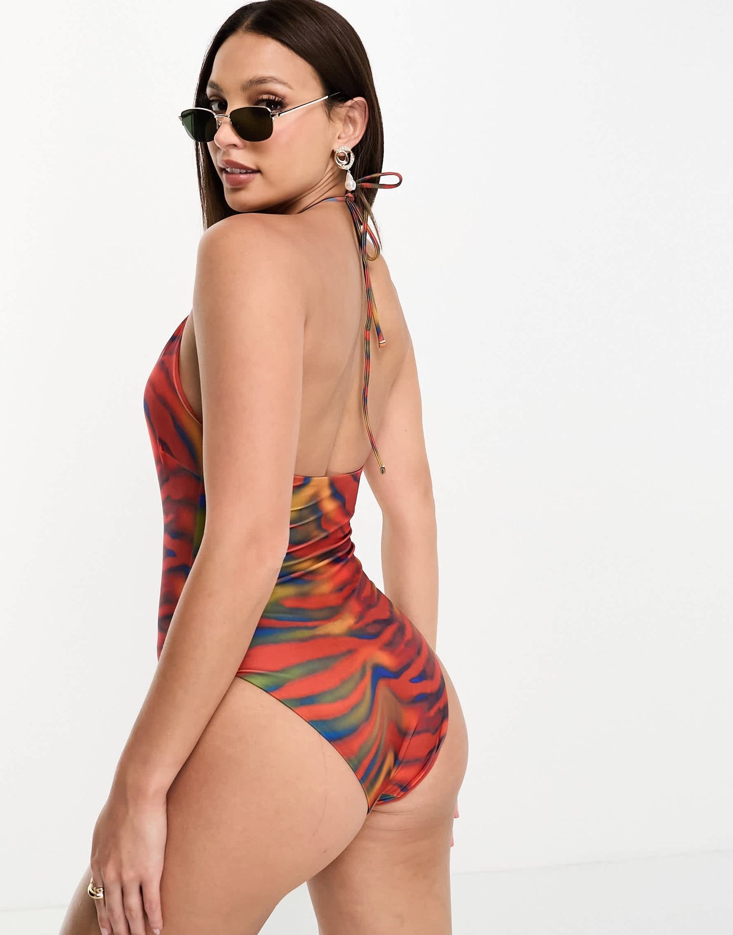 ASOS DESIGN Tall cut out halter neck swimsuit in heat map zebra print