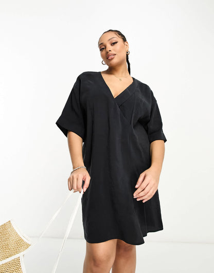 ASOS DESIGN Curve oversized boxy mini dress with wrap collar detail in black