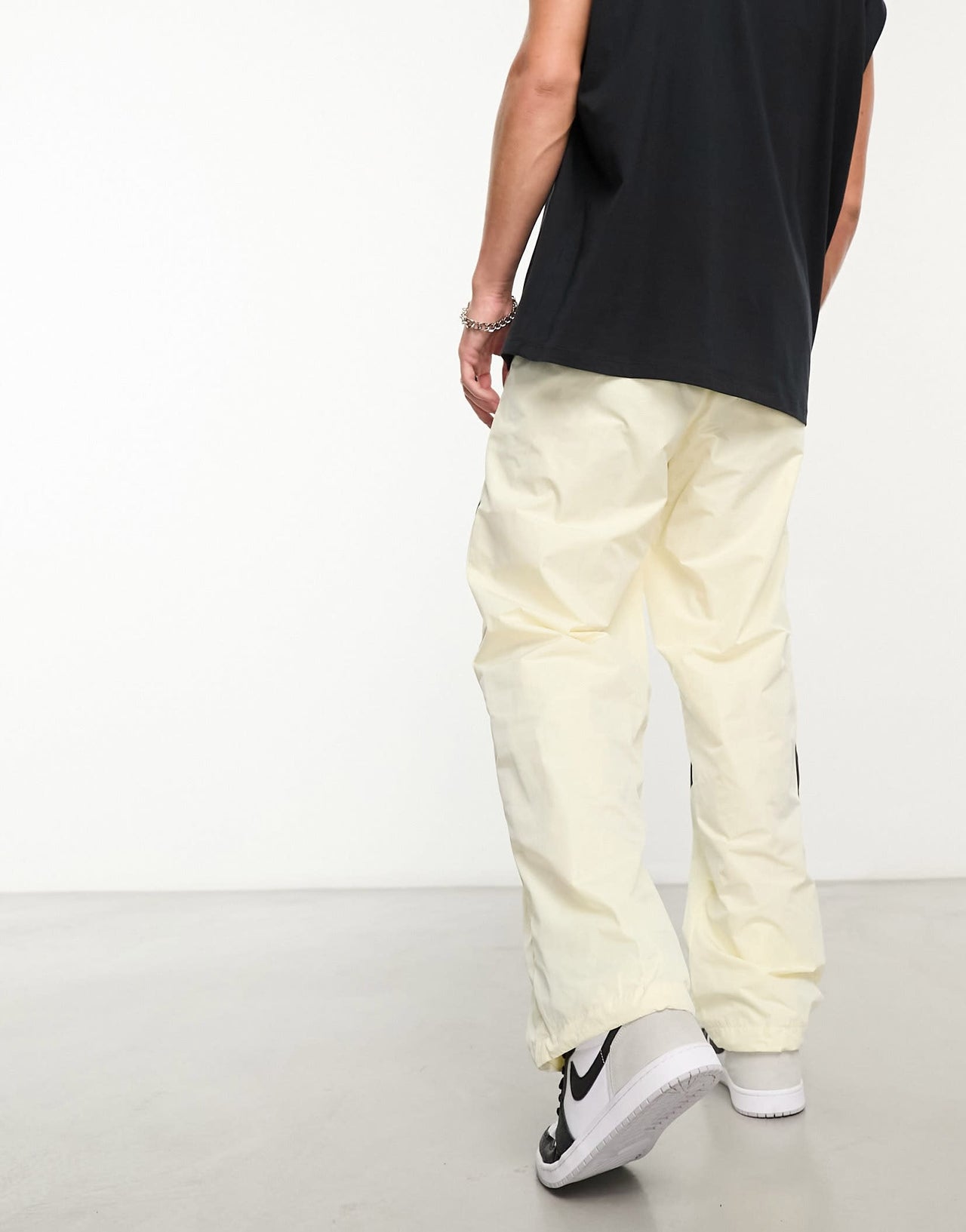 Nike Swoosh woven trousers in cream