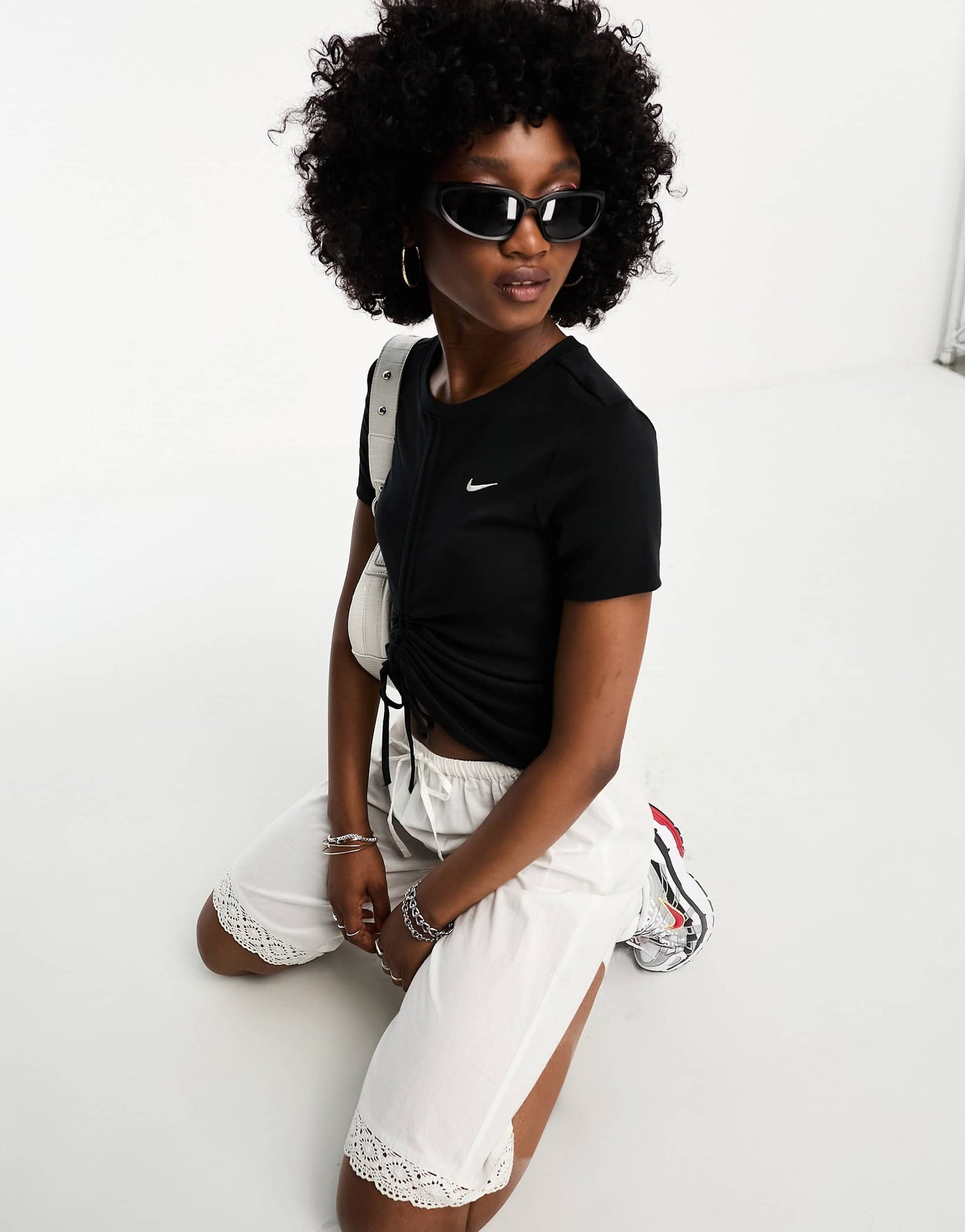 Nike mini swoosh rib tie front t-shirt in black