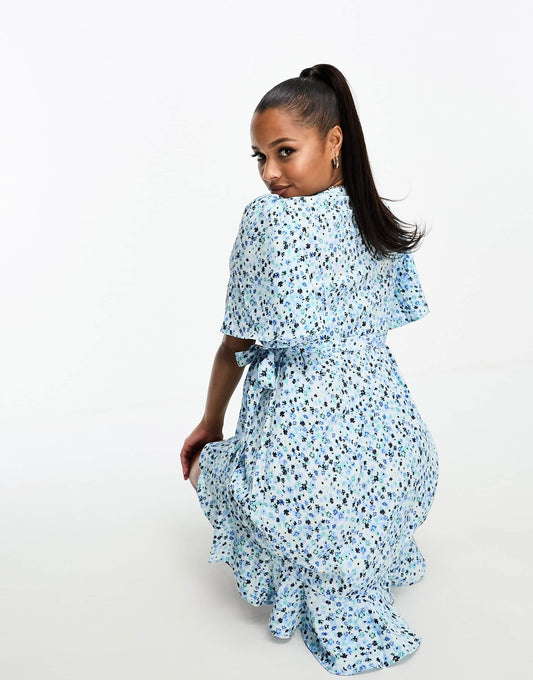 Vero Moda Petite wrap front mini dress in blue florals