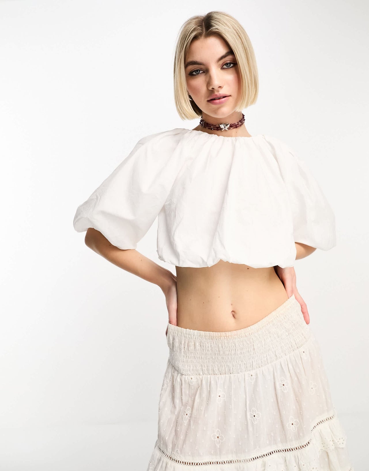 COLLUSION crop bubble hem top in white