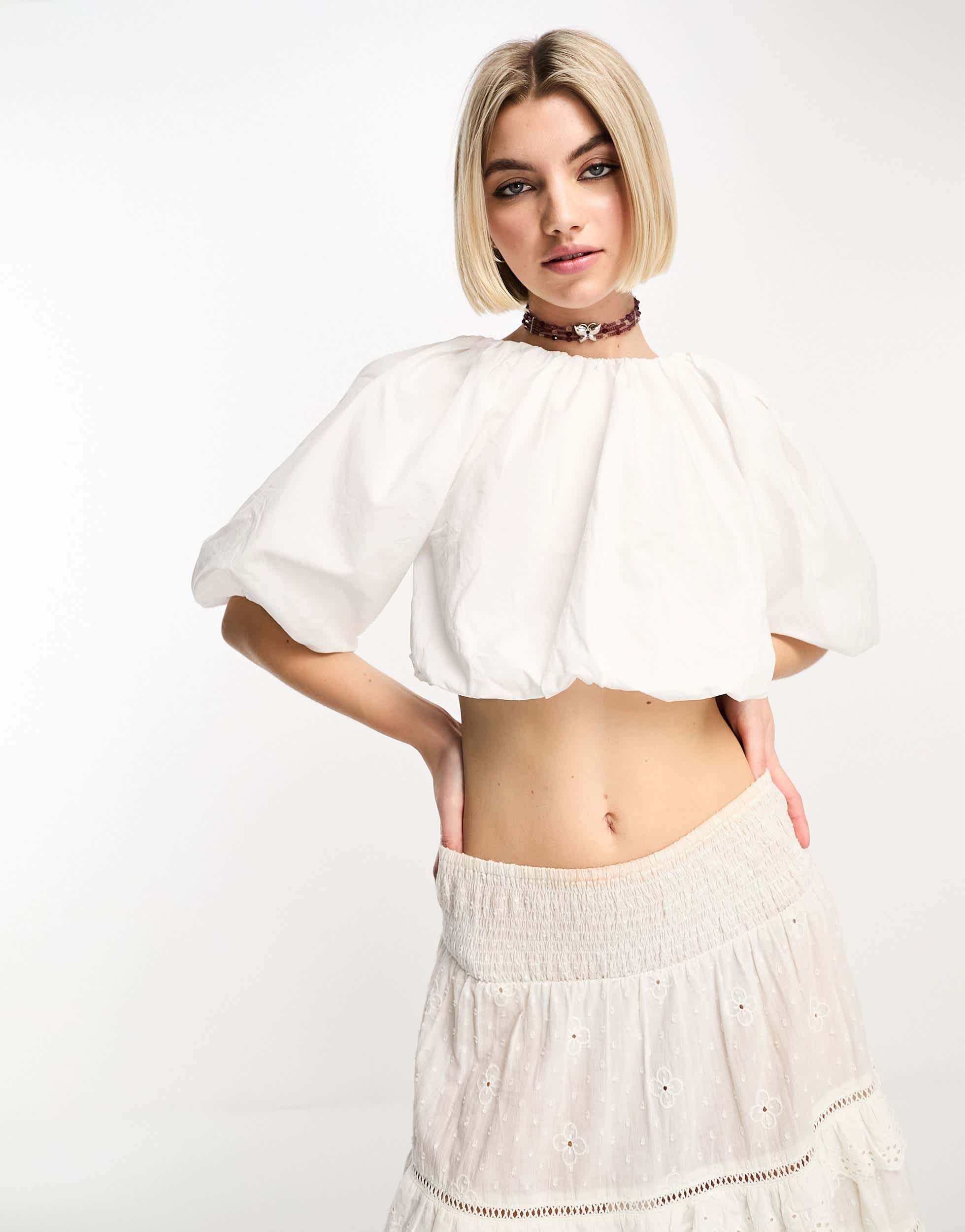 COLLUSION crop bubble hem top in white