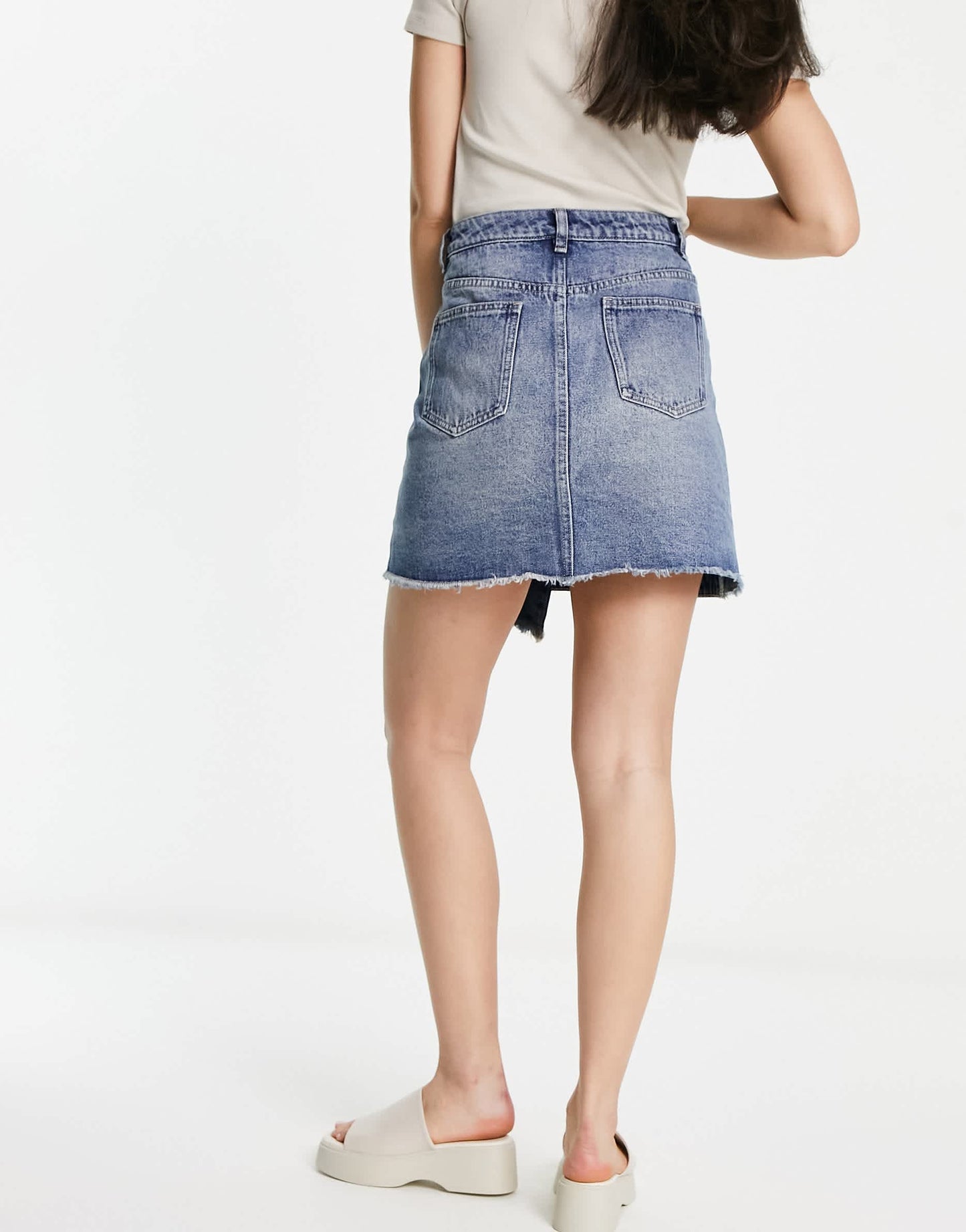 Urban Revivo asymmetric denim mini skirt in blue