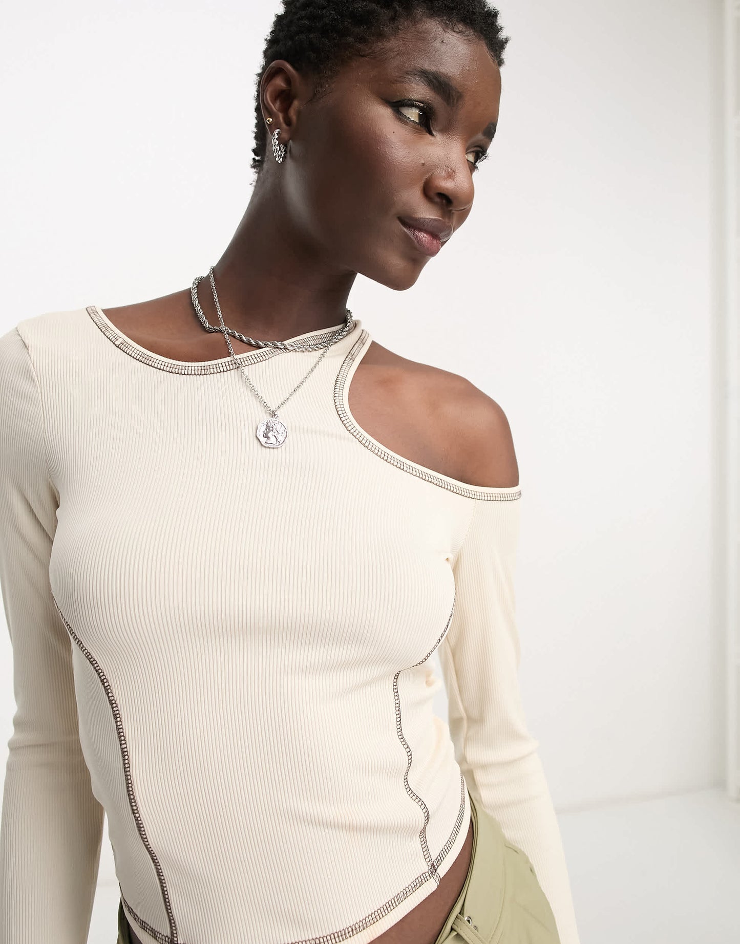 Bershka long sleeve asymmetric contrast stitching top in Ecru