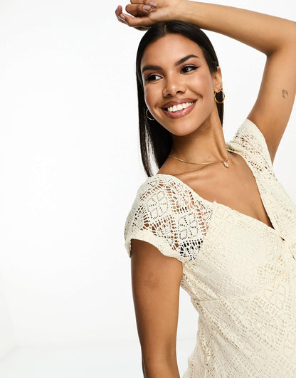 Vero Moda Maternity knot front lace mini dress in cream