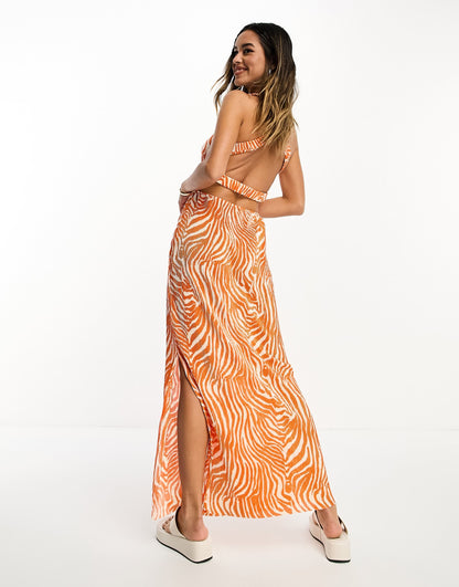 ASOS DESIGN plisse elastic strappy back midi dress in orange zebra