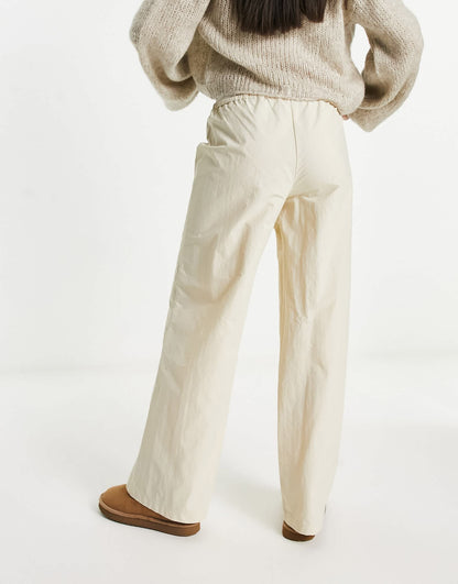 COLLUSION low rise wide leg nylon parachute pant in ecru