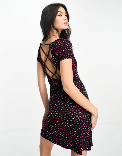 Only cross back detail mini dress in black and red ditsy floral